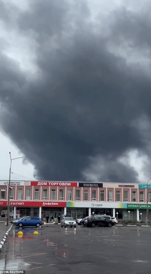 Smoke rises following what local authorities called a Ukrainian drone attack, in the course of Russia-Ukraine conflict, in Olenegorsk of the Murmansk region, Russia, in this still image from social media video released on June 1, 2025