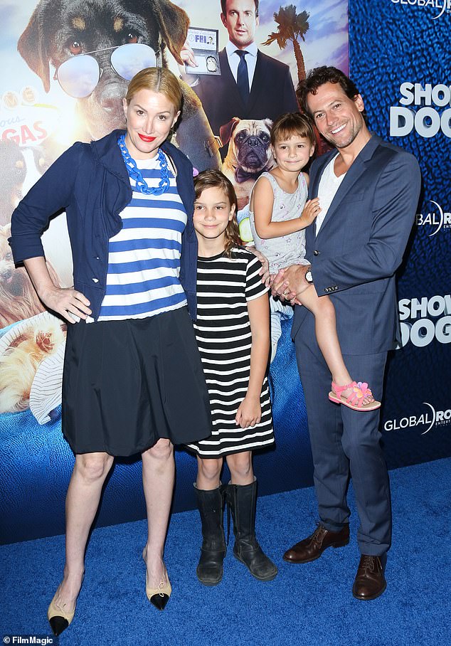 However, they are still battling fiercely over spousal support and custody and financial support for their two daughters Ella, 15, and Elsie, 11 [pictured in 2018 with daughters Ella and Elsie]