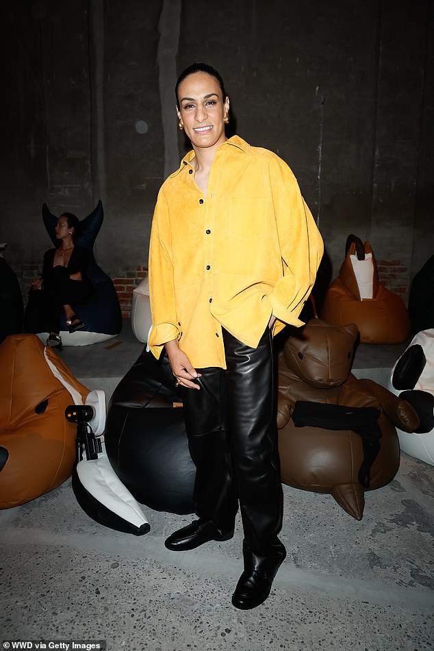 Khelif (pictured at Bottega Veneta's S/S 2025 fashion show in September) has strenuously denied claims that she is not a woman