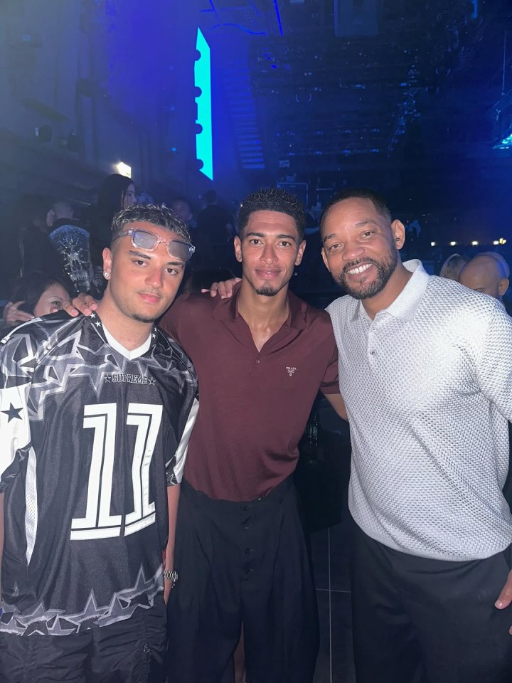 Jude Bellingham with two other men.