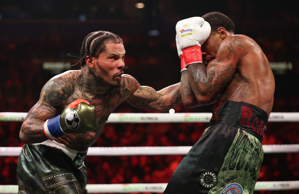 Gervonta Davis punches Lamont Roach Jr. in a boxing match.