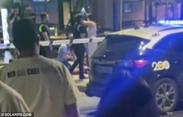 Police working at the crime scene after the attack late on Saturday