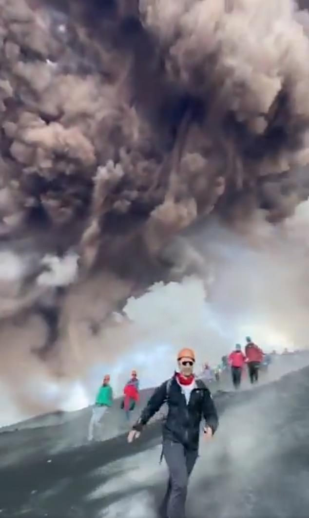 Tourists fled for their life after a monstrous ash cloud exploded behind them on Mount Etna