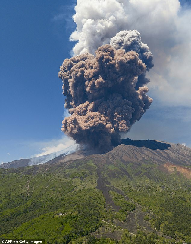 Terrifying clouds of ash more than a mile high erupted from Mount Etna this morning