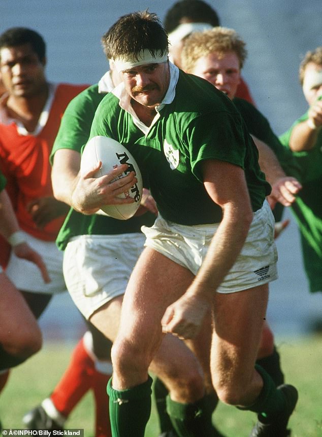 The designer, 40, hailing from Magherafelt, of County Derry, grew up as the eldest of three, as the son of rugby union legend Willie Anderson (pictured), and Heather Buckley, a secondary school teacher