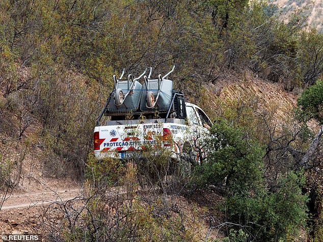 A vehicle of Portugal's Emergency Services carries wheelbarrows at the site of a remote reservoir during the search in Silves, Portugal, May 22, 2023