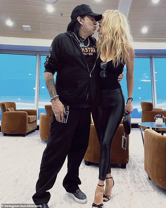 A grieving Downe, 60, said on SiriusXM's Trunk Nation With Eddie Trunk via Blabbermouth he was 'hanging in there' as he navigates life without his longtime partner, saying: 'I'm just taking it a day at a time