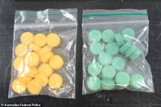 Pictured: Yellow and green pure Nitazene pills seized in Australia in 2023
