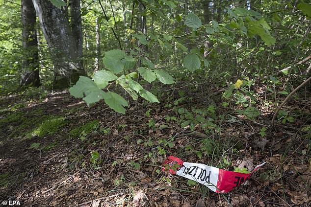 Pictured: A police cordon on the forest floor in connection with the first use of the death capsule Sarco in Merishausen, Switzerland, September 25, 2024