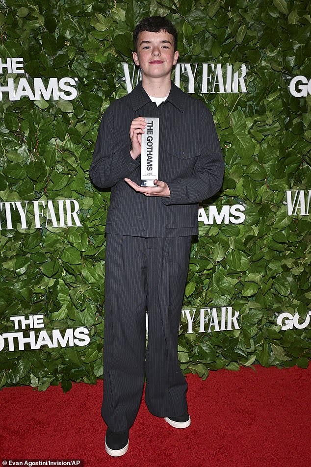 Cooper with his award for Outstanding Supporting Performance in a Limited Series