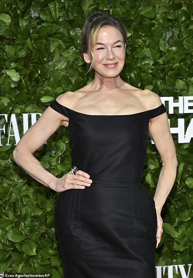 She wore her blonde locks in a fuss-free updo that included a side part and face-framing loose strands at the front