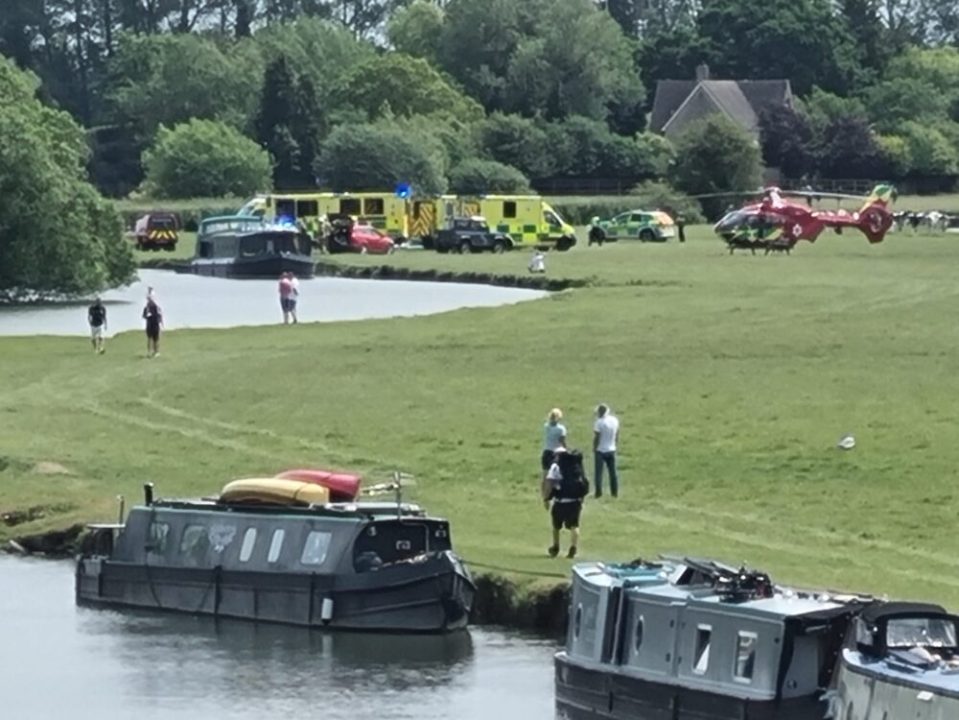 Emergency responders at the scene of a boat explosion on the Thames River.