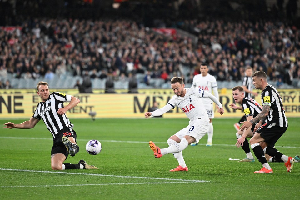 James Maddison of Tottenham Hotspur kicking a soccer ball during a match.
