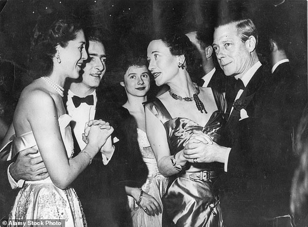 Wallis and Edward dancing at a party in New York. The jet-setting couple were known for travelling around the world