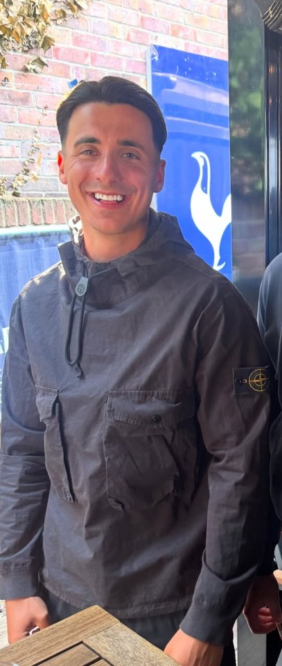 Tommy Bradley, Love Island, wearing a dark gray jacket.