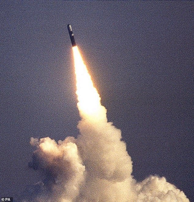 Cash will be spent in improving Britain's nuclear capabilities. Pictured is a Trident missile - capable of carrying a nuclear warhead - being launched