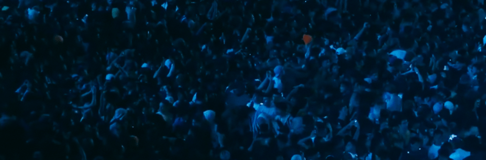 A dense crowd at a concert.