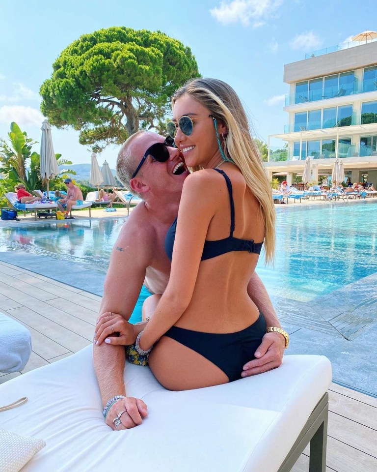 Jamie Laing and Sophie Habboo by a pool.