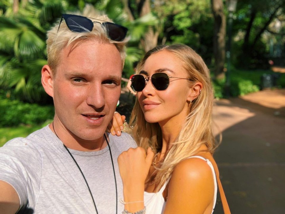 Selfie of a man and woman outdoors.
