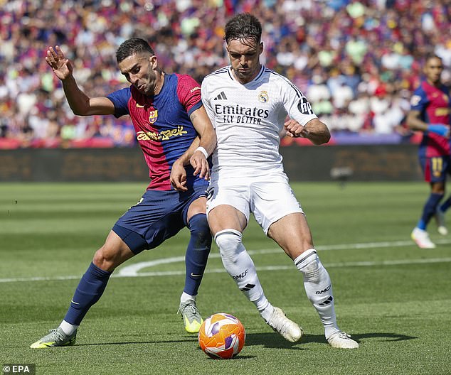 The Real Madrid man (right) was subject to ''Asencio, to jail' chants in the El Clasico this month