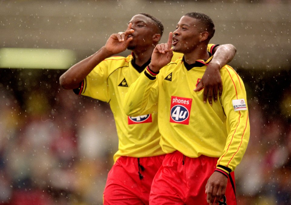 Gifton Noel-Williams and Micah Hyde of Watford celebrating a goal.
