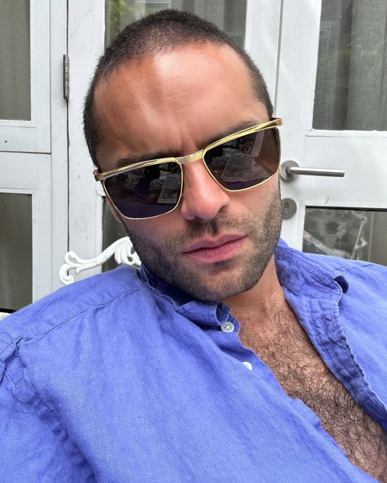 Portrait of Sebastian De Souza wearing sunglasses.