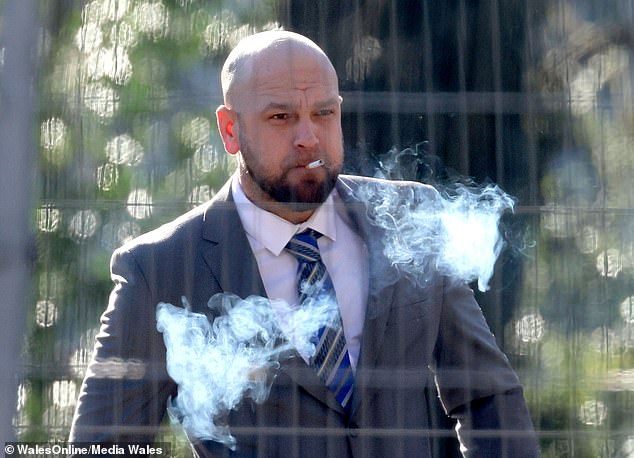 Kurtis Dwyer, 35, has been released after serving only two-and-a-half months behind bars after running over the child (Pictured smoking outside Cardiff Crown Court in March)