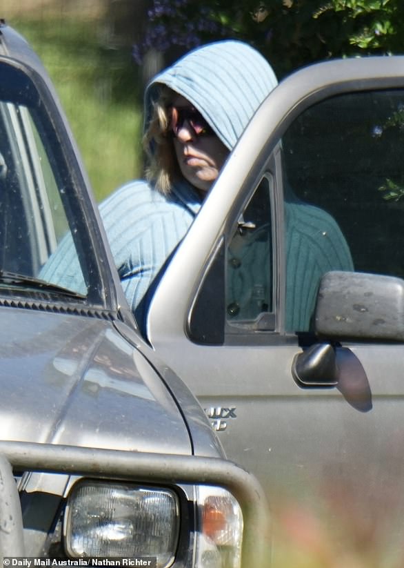 Bromley visited the local police station as part of her bail conditions, trying to hide her face and shunning questions from reporters