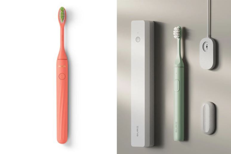 Two electric toothbrushes with charging stations.