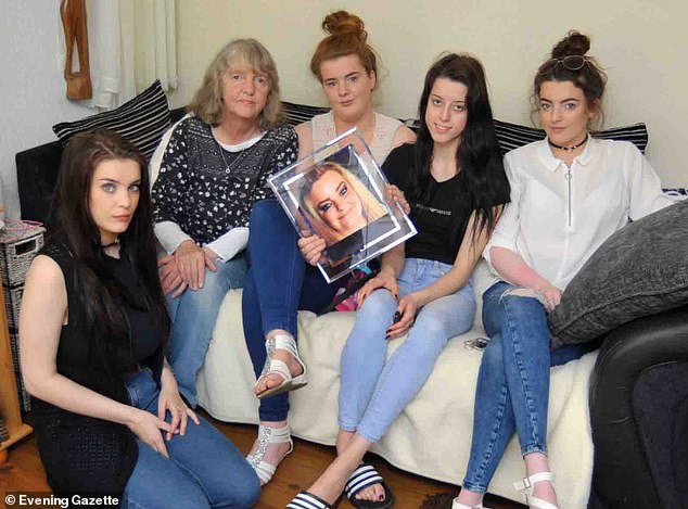 From L-R, Ms Whiting's daughter Leah Bell, mother Joy, daughter Emma Bell, niece Demi Wathen and daughter Chloey Bell, holding up a photo of her