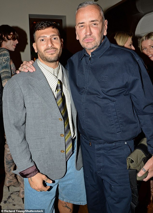 The DJ, 58, was joined at the party by his new husband Stavros, 32, who opted for a quirky ensemble, pairing denim shorts with a checked shirt, striped tie and grey blazer jacket