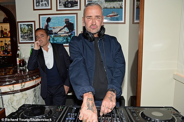 Fat Tony was seen commanding the DJ decks as he kept it stylish in a navy jacket and matching trousers