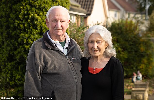 Concerns: Retired policeman Paul Bryant (pictured with wife Liz) has been told he must switch to a smart meter