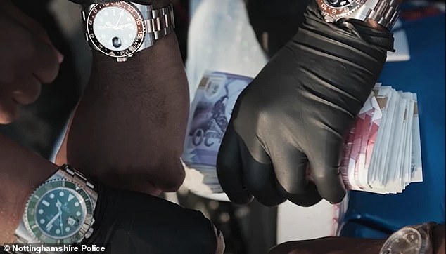 Cash and watches as seen in the gang's Rolls-Royce rap video