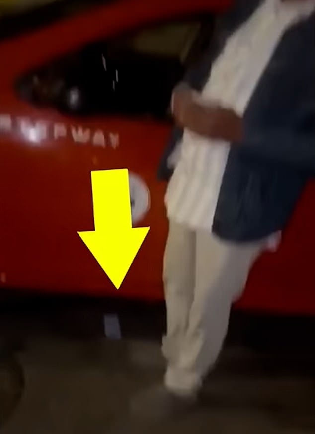 Footage shows how he has hidden a 200 dirham (£15) note beneath his vehicle, seemingly hoping the women wouldn't notice