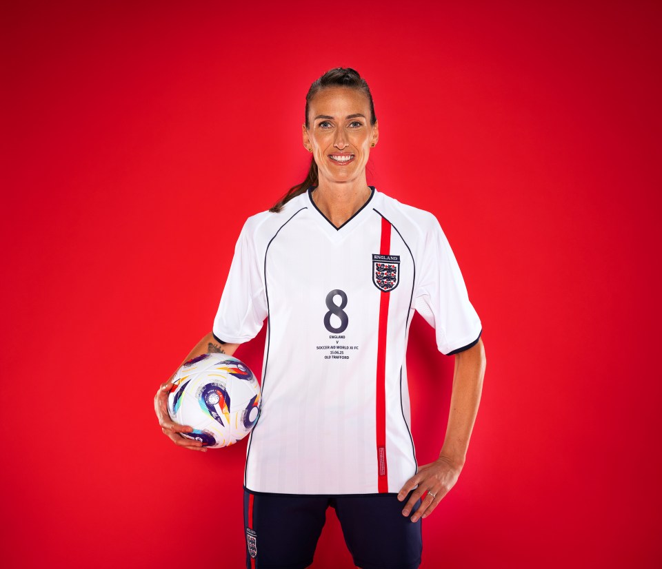 Jill Scott holding a soccer ball in her England uniform.