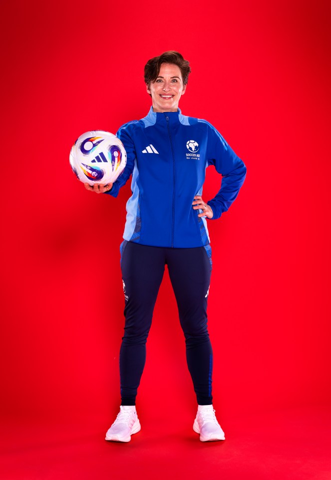 Vicky McClure, England coach for Soccer Aid, holding a soccer ball.