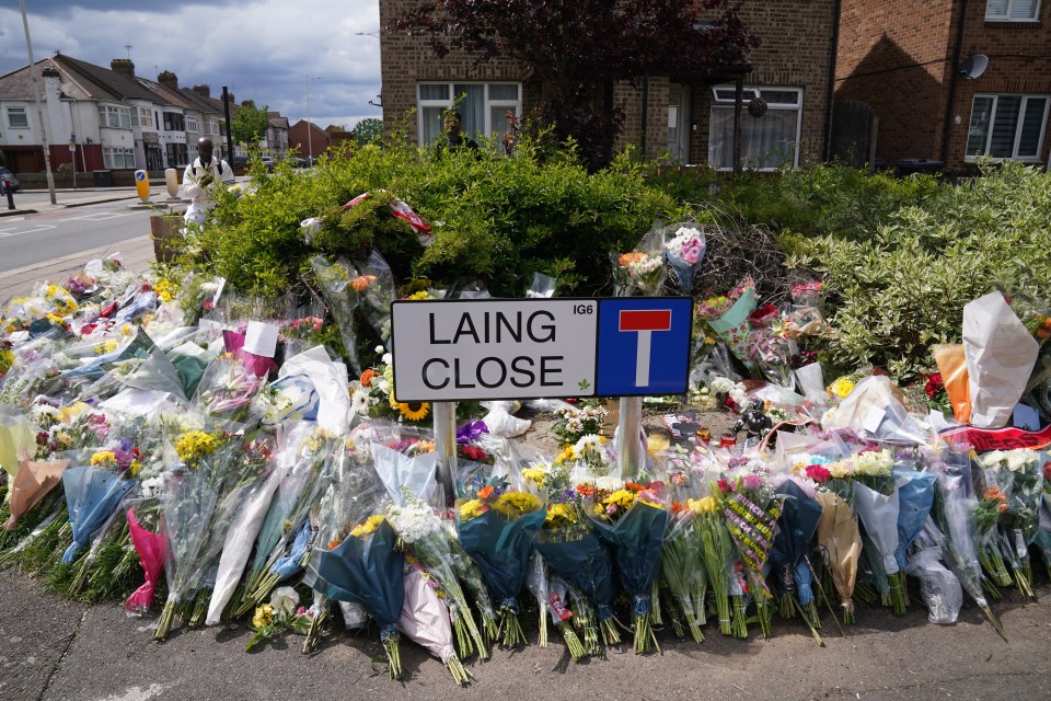 Floral tributes at Laing Close.