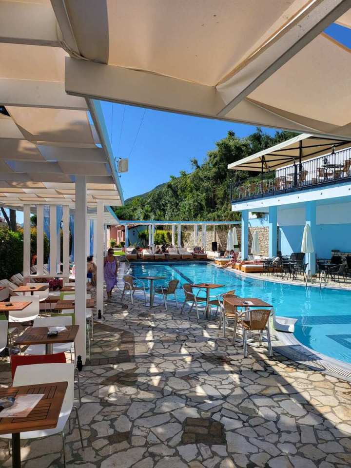 Lido Corfu Sun Hotel pool and patio area.
