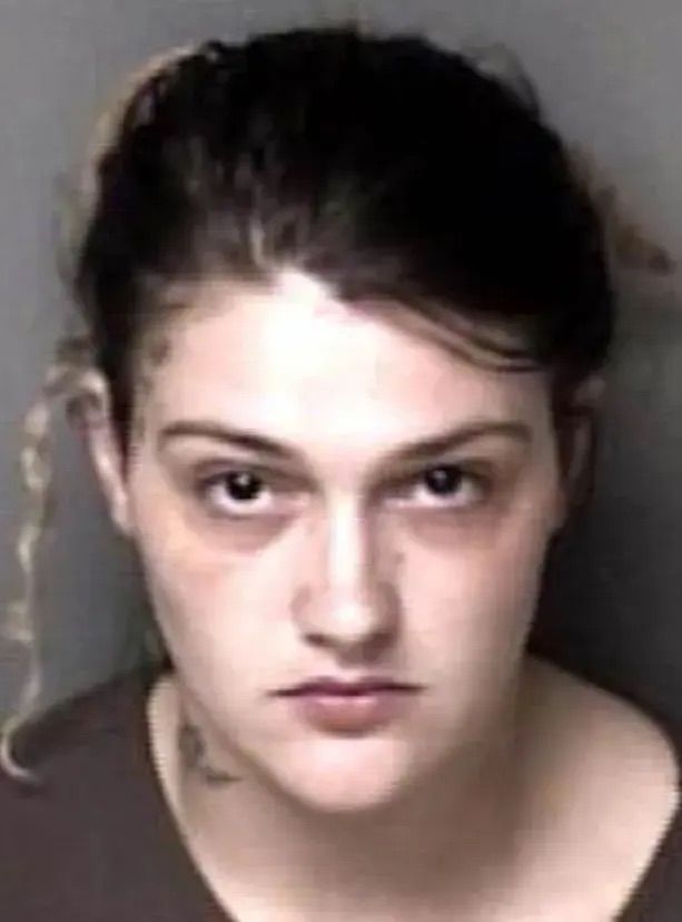 Mugshot of a woman arrested in connection with a fatal accident.