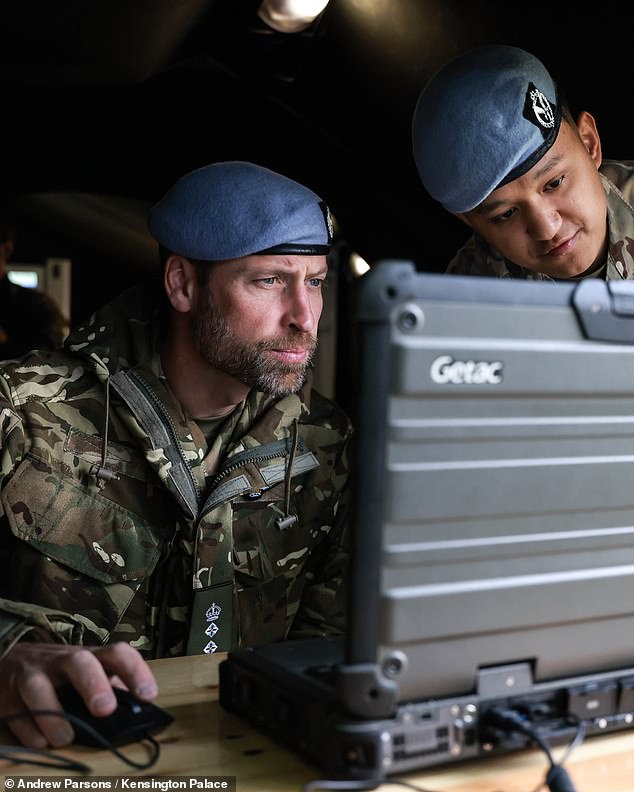 Inside a planning and executive tent, William (pictured left) examined maps and technologies for tracking live locations of soldiers taking part in NATO training in Norway