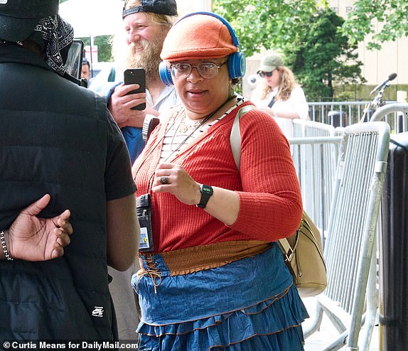Jacquline Williams talks to the media outside of the Federal Court building in Manhattan after she caused a disrution in the Sean Combs trial when she had an outburst in the courtroom causing her to be removed from the courtroom.