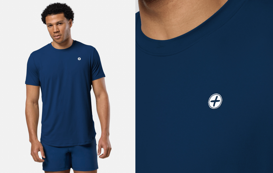 Man in navy blue t-shirt and shorts. Close-up of shirt detail.