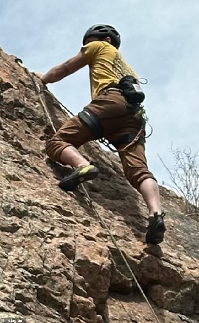 Greener (pictured climbing a mountain on his Instagram on April 13) has now taken up climbing and was one of only two people with his disability to ascend 14,000 feet on foot