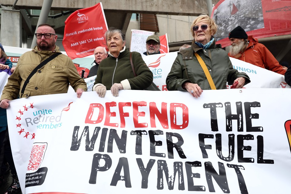 Protestors holding a banner that reads "DEFEND THE WINTER FUEL PAYMENT".