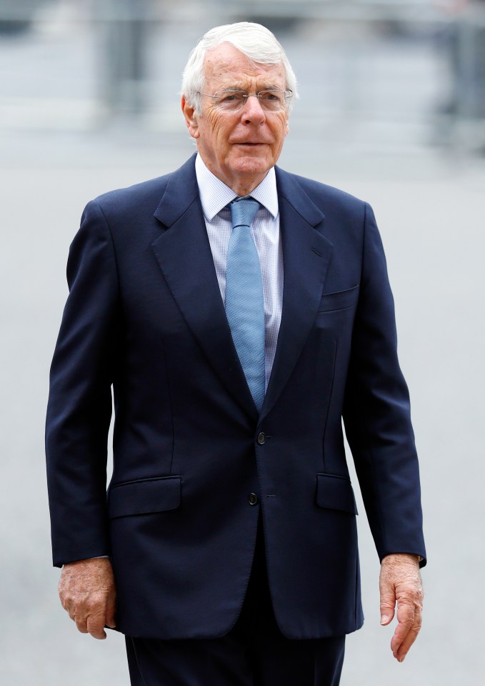 Sir John Major at a memorial service.