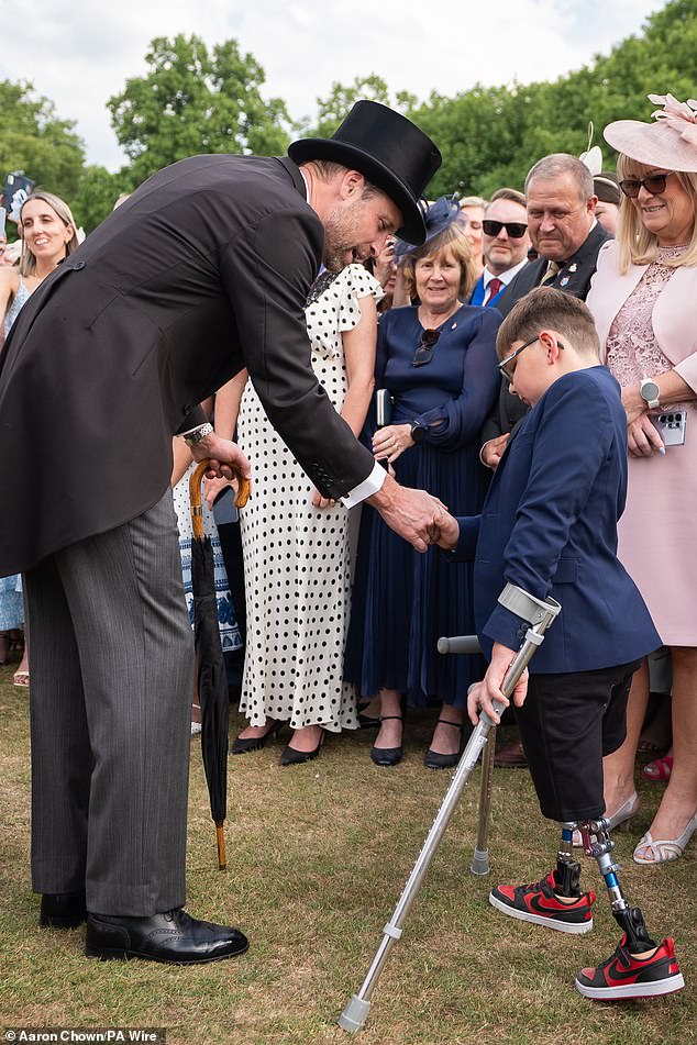 Prince William meets Tony Hudgell during a Royal Garden Party at Buckingham Palace -- May 20, 2025