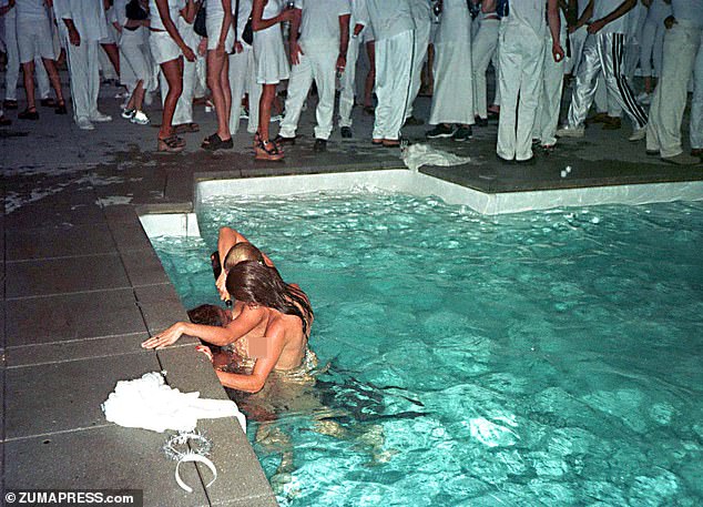In pictures shot at Diddy's penultimate party in 2008, scantily clad, half-naked girls cavort in the swimming pool