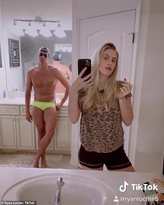 Lochte and Kayla are seen in a playful TikTok, as he posed in his swimming attire