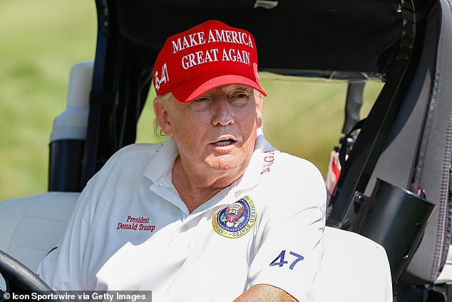 Former President Donald Trump photographed driving a golf cart at Bedminster in August 2023